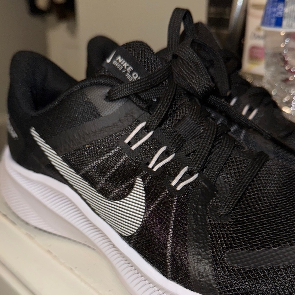 Nike Black Mesh Sneakers with White Swoosh